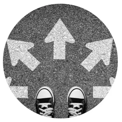 Arrows on the floor around someone's feet